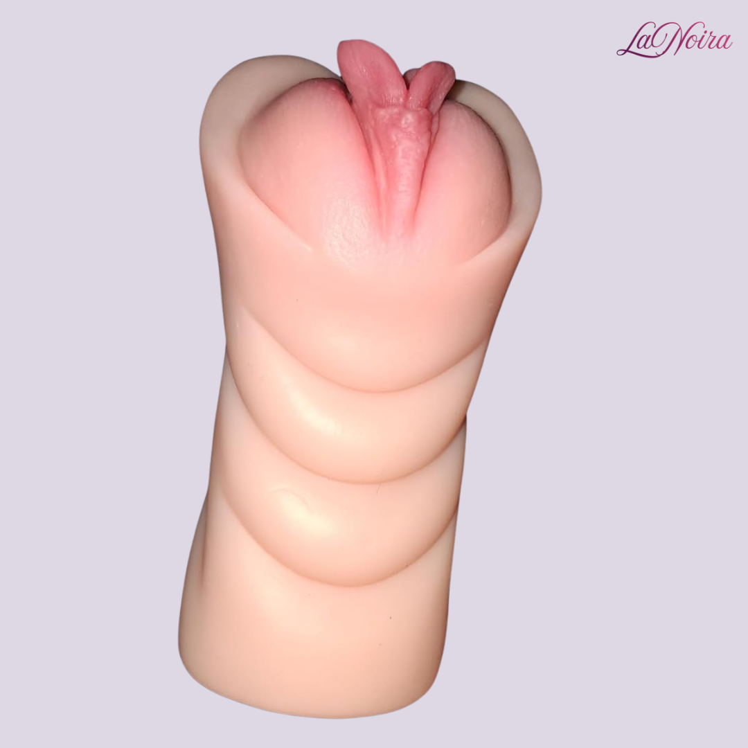 Top view of Intimax Twin Delight pocket stroker highlighting dual-lip style entrance and layered silicone design