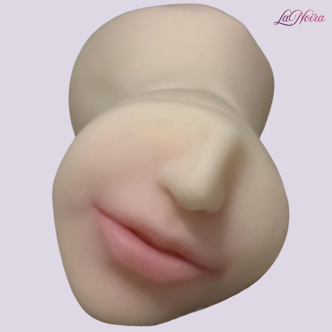 Front view of Pleasure Trio male masturbator featuring mouth-style opening with lifelike facial detailing