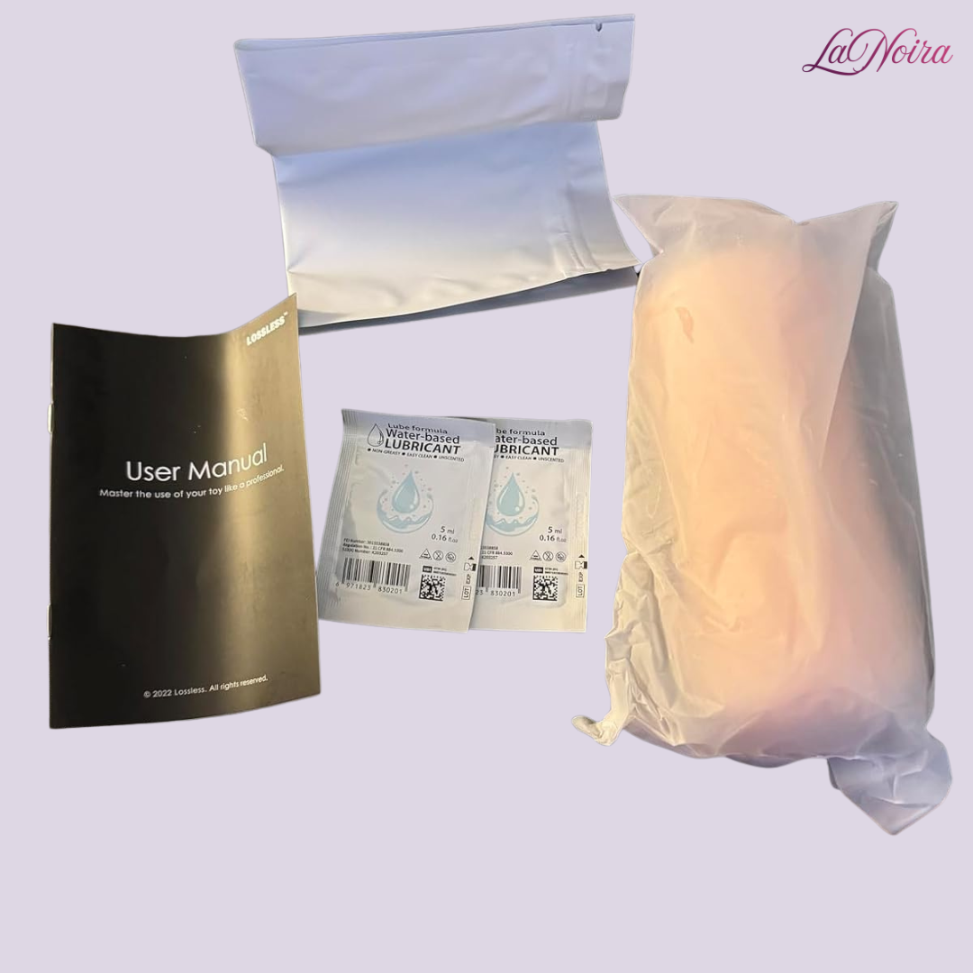 SilkTouch pocket stroker displayed with accessories including user manual, storage pouch, and water-based lubricant sachets