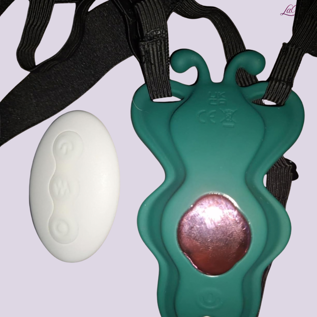 Close-up of LaNoira butterfly vibrator with wireless remote control and adjustable strap attachment