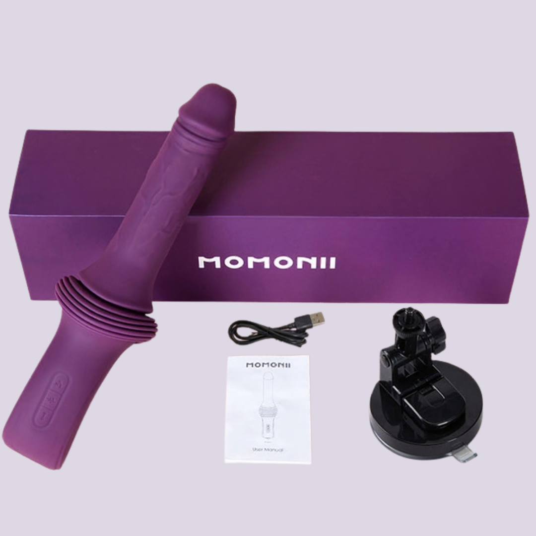 LaNoira Accordia thrusting dildo machine shown with retail box, charging cable, suction base and user manual