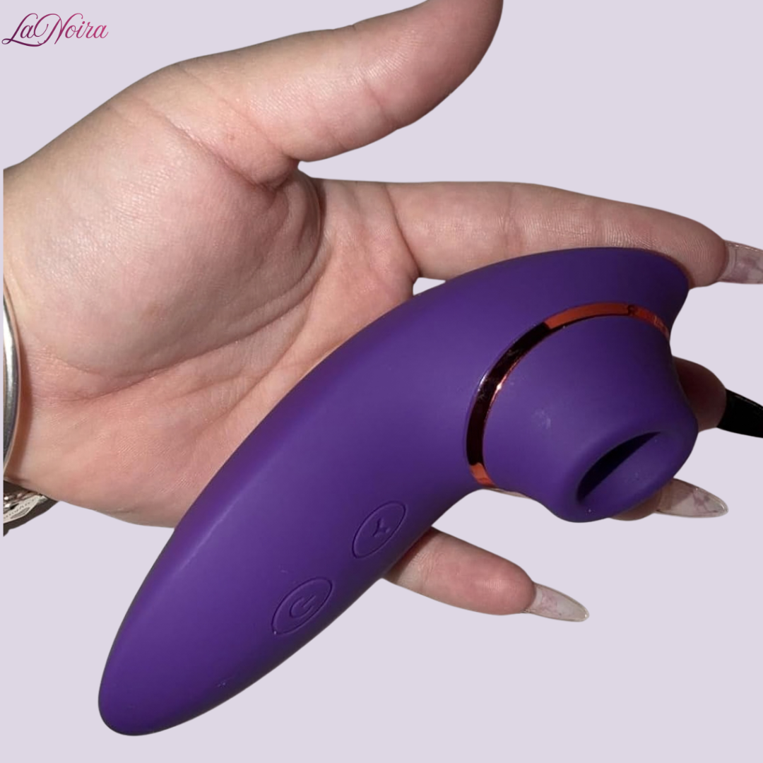 Side angle of LaNoira Aria clitoral stimulator showing curved profile and suction tip