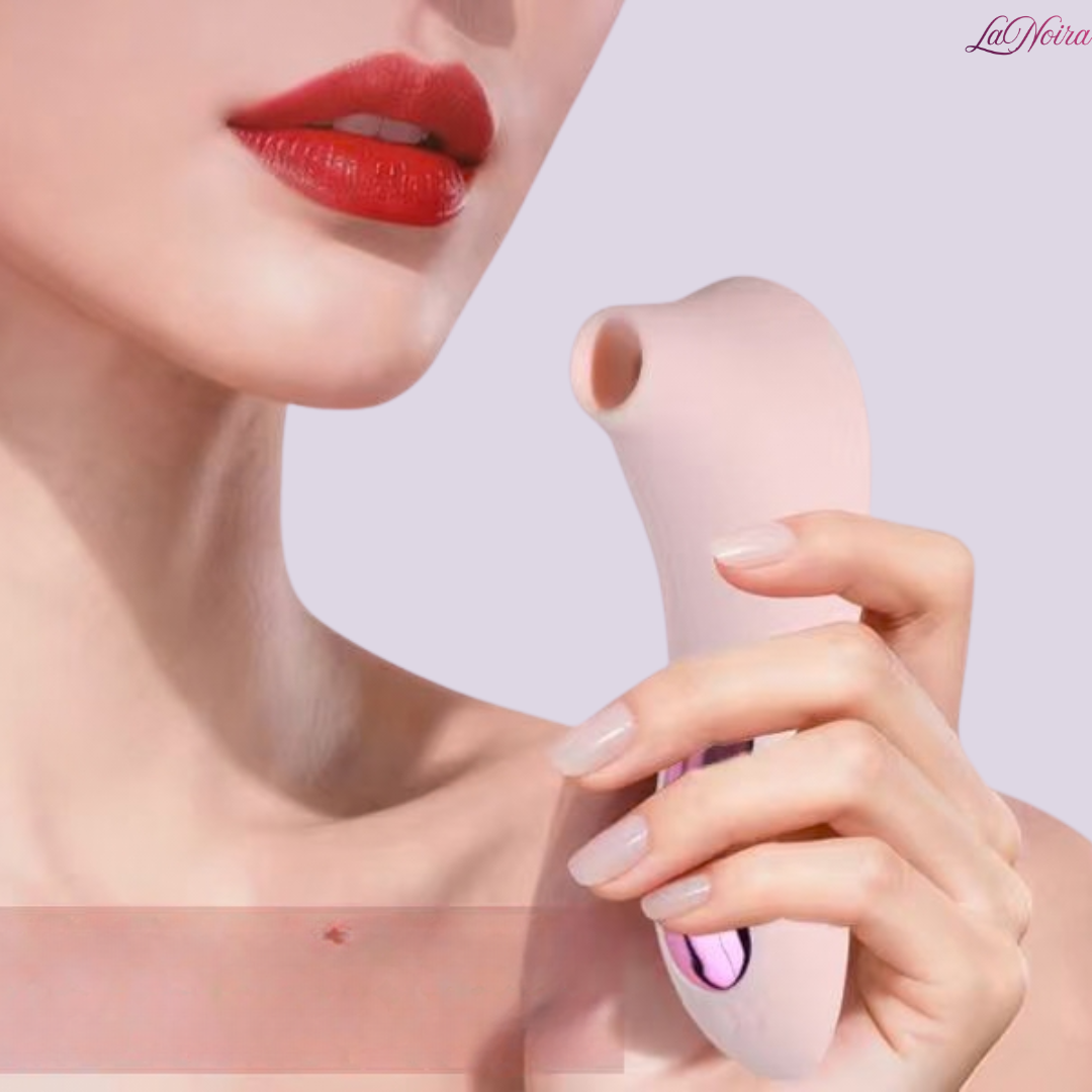 LaNoira Aura clitoral stimulator held near face showing compact curved shape and suction tip