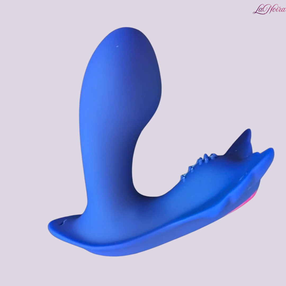 Blue silicone G-spot and clitoral stimulator with curved internal arm and textured external tip on light background