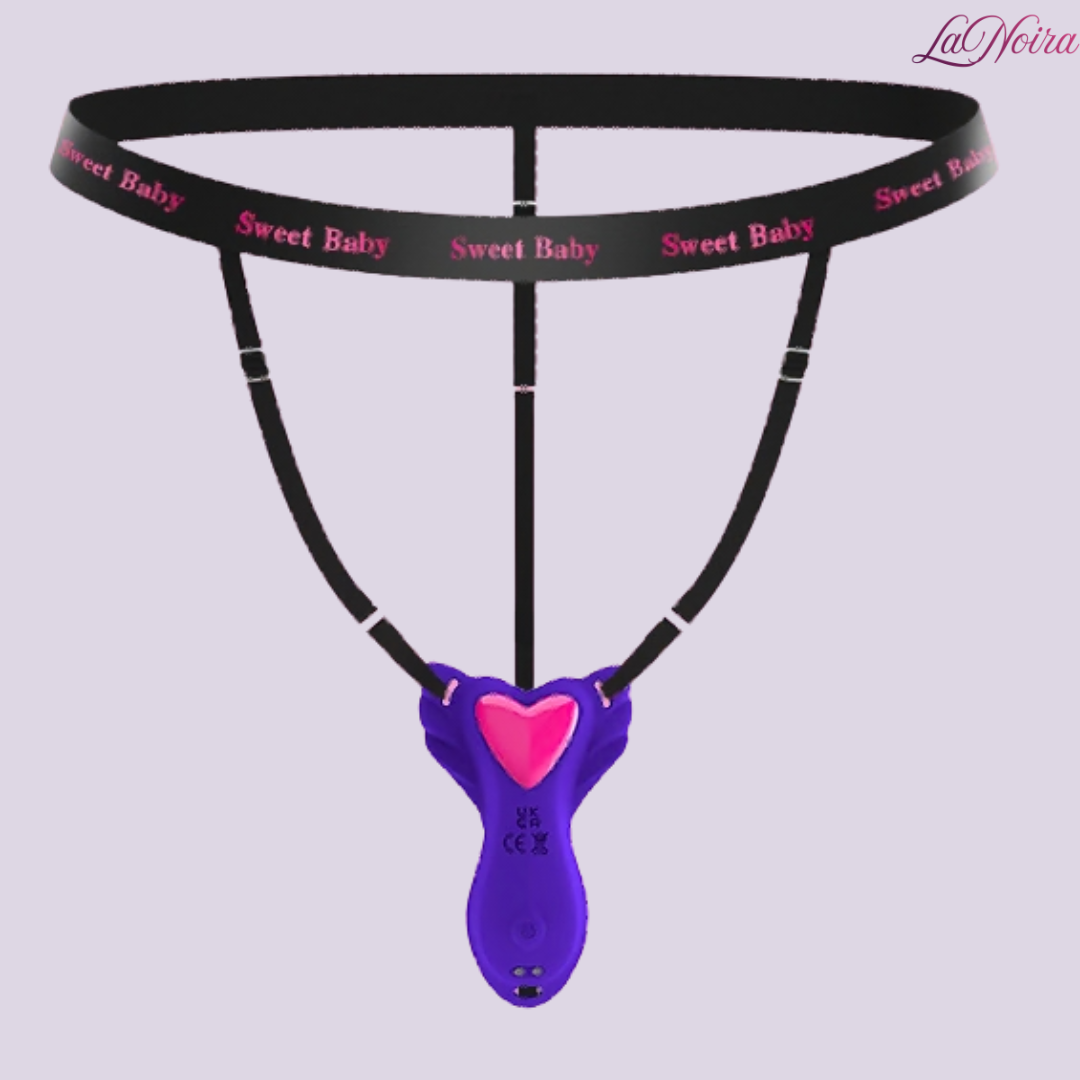 Sweet Baby adjustable black harness with purple wearable vibrator and pink heart-shaped control panel, front view