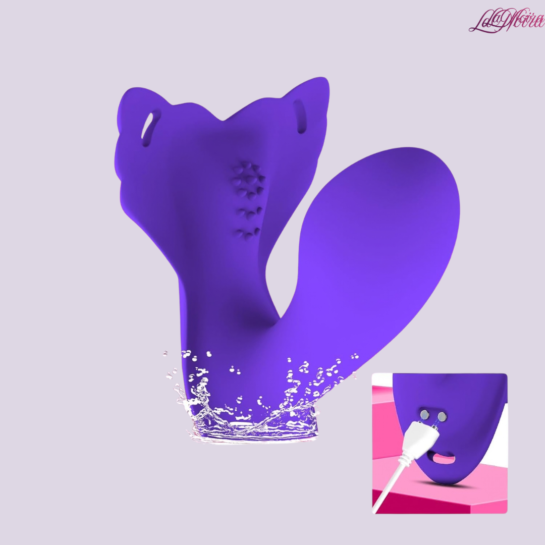 Purple wearable vibrator splashed with water to show waterproof design, with magnetic charging port inset