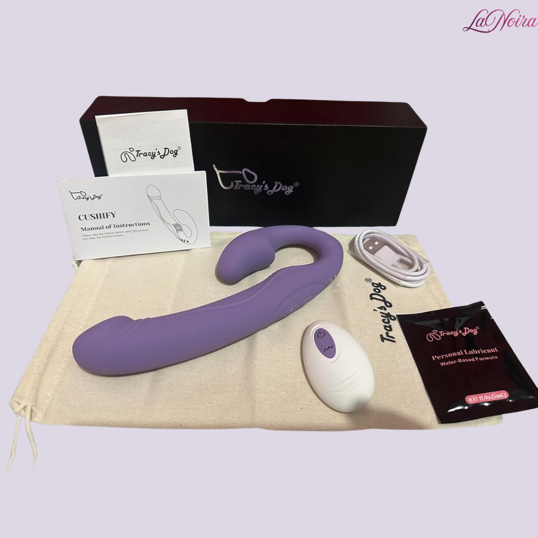 Tracy’s Dog Cushify strapless strap-on vibrator box contents including device, remote control, charging cable, pouch, lubricant, and manuals