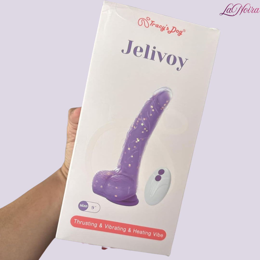 Tracy’s Dog Jelivoy retail box showing purple thrusting dildo with remote control and ‘Thrusting, Vibrating & Heating’ feature label.