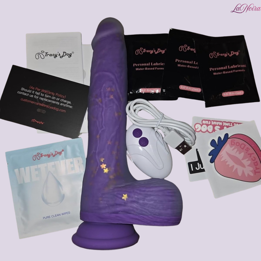 Tracy’s Dog Jelivoy thrusting dildo kit laid out with remote control, USB charging cable, lubricant sachets, wipes, and instruction cards.