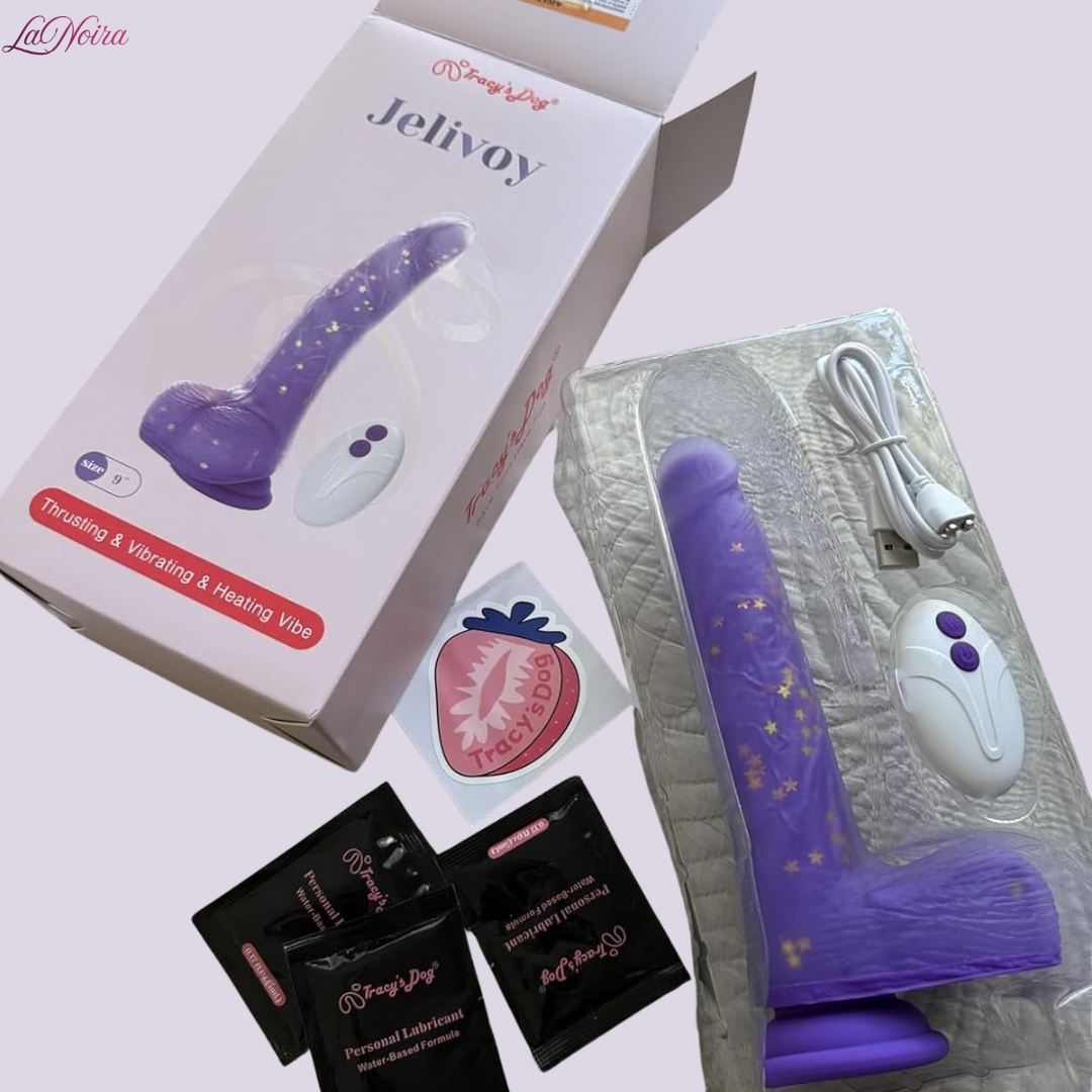 Opened Tracy’s Dog Jelivoy box showing purple thrusting dildo, remote control, charging cable, lubricant sachets, and inner packaging tray.
