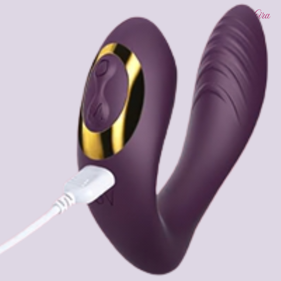 Tracy’s Dog OG wearable vibrator connected to USB charging cable, close-up of control panel