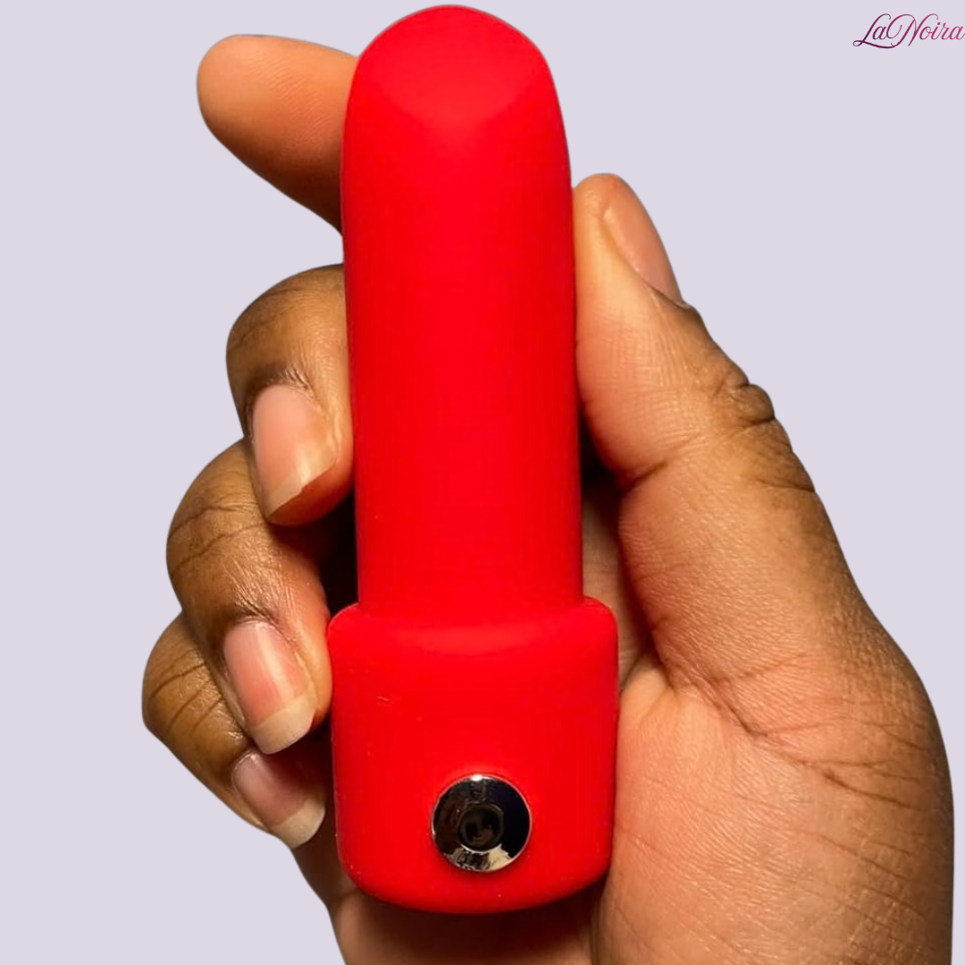 Tracy’s Dog Surreal bullet vibrator held in hand for size reference