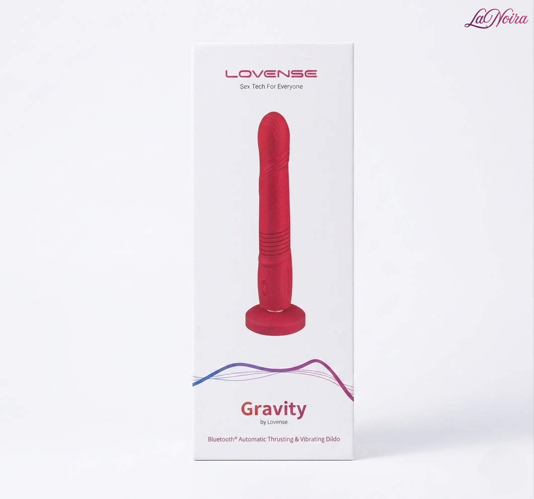 Lovense Gravity automatic thrusting and vibrating G-spot dildo with app-controlled functionality shown on retail packaging against a white background.