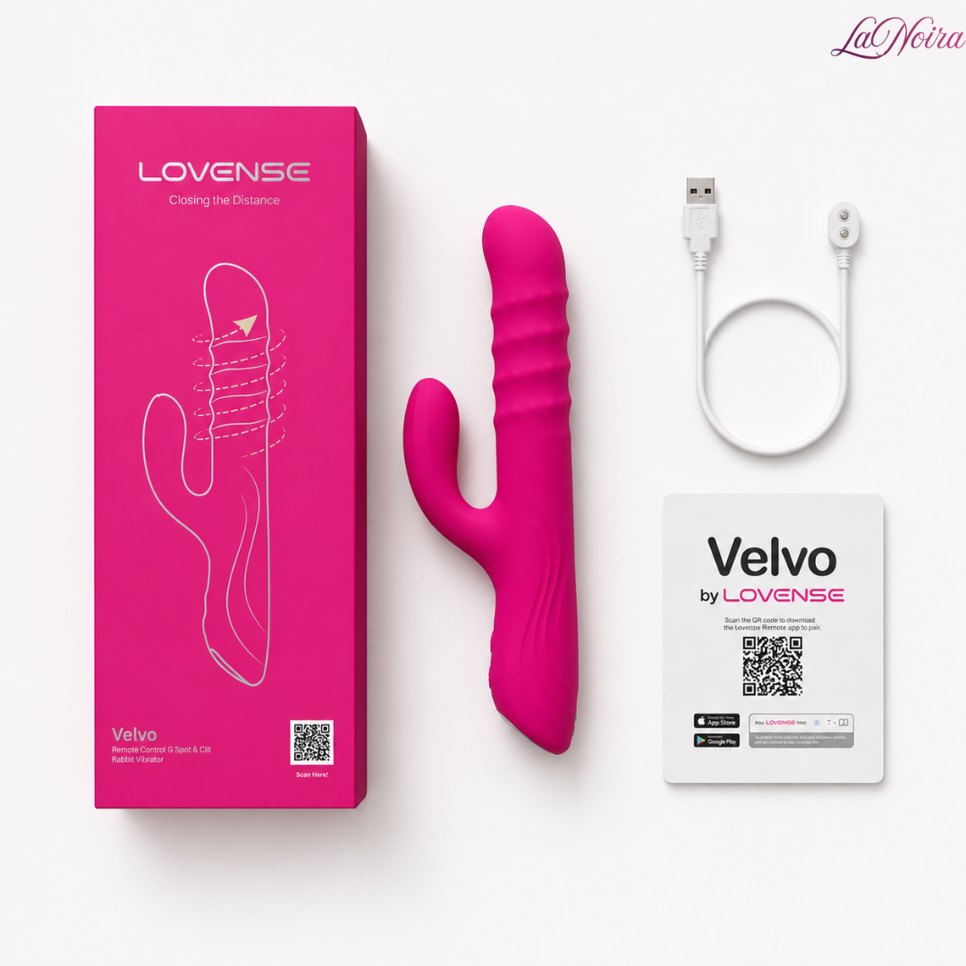 Lovense Velvo package contents including rabbit vibrator, magnetic USB charging cable, user guide card, and retail packaging arranged in a flat-lay presentation.