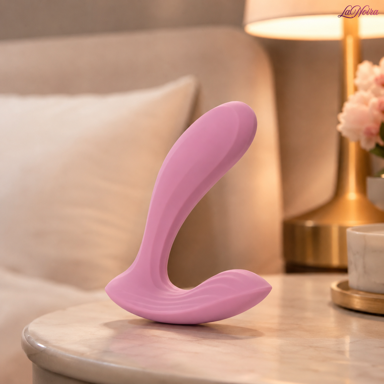 Svakom Erica wearable couples vibrator standing on a bedside table in a luxury bedroom setting, showcasing its ergonomic wearable design – LaNoira India